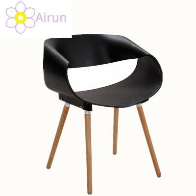 Import Fancy Modern White Wooden Legs Dinner Plastic Chair in China PP Dining Kitchen Plastic Dining Chair for Sale