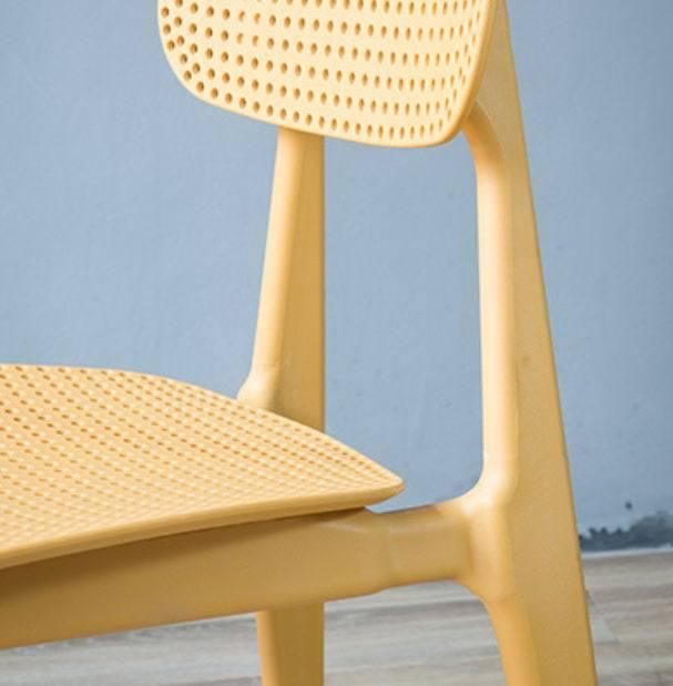 Replica North European Style Perforated Plastic Ins Hollow Dining Chair