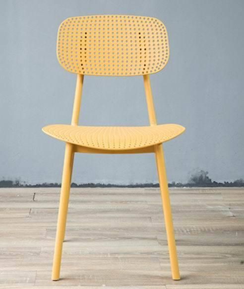 Replica North European Style Perforated Plastic Ins Hollow Dining Chair