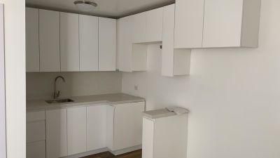 Bahamas Apartment Project Matt White Lacquer Finish 45&deg; Handleless Kitchen Cabinets