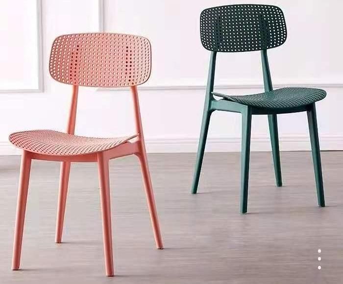 Replica North European Style Perforated Plastic Ins Hollow Dining Chair