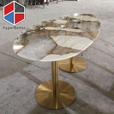 Oval Patagonia Granite Dining Table with Golden Table Legs