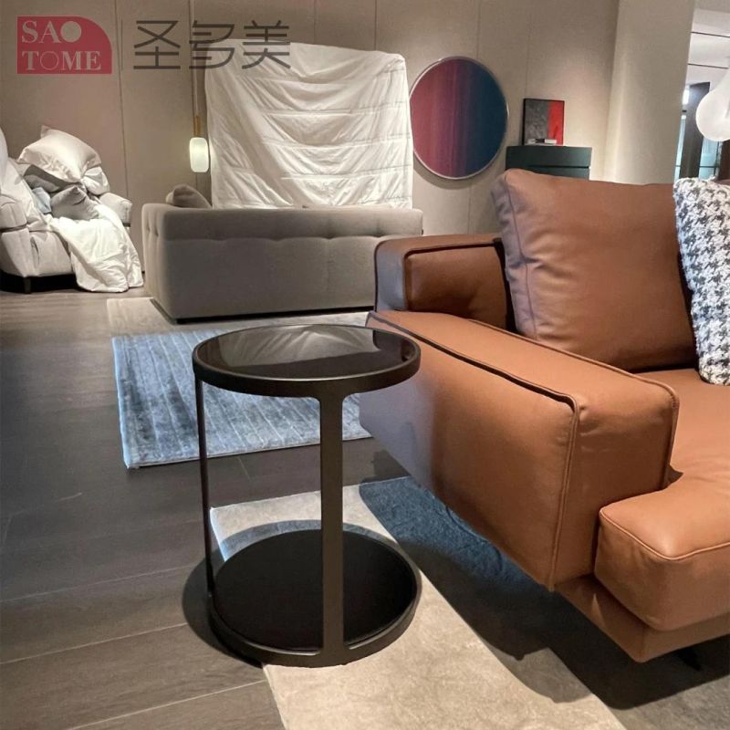 Small Round Table with Gray Glass Surface on Wooden Coffee Table