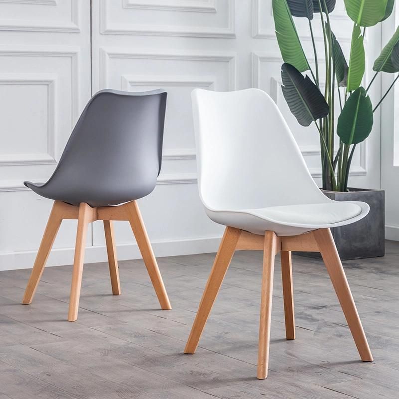 China Modern Home Furniture Tulip Dining Chair with Beech Legs Plastic Dining Chair Price for Sale