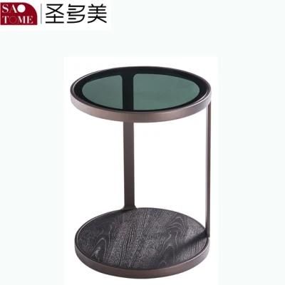 Small Round Table with Gray Glass Surface on Wooden Coffee Table